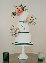 white coral & peach wedding cake